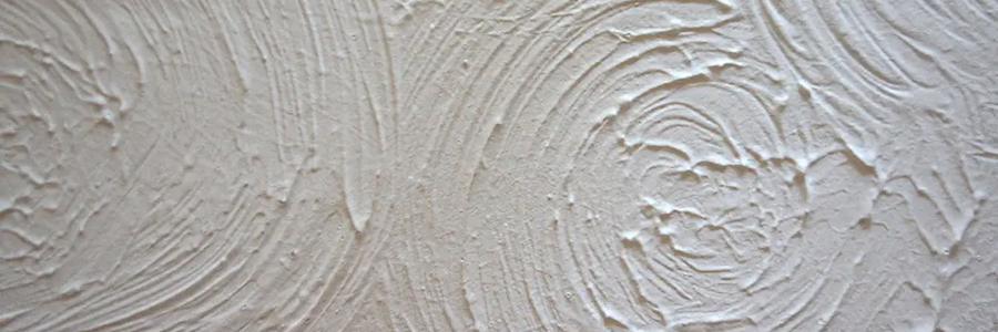 Textured coating that may contain asbestos