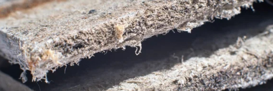 Asbestos insulation board commonly used in old homes