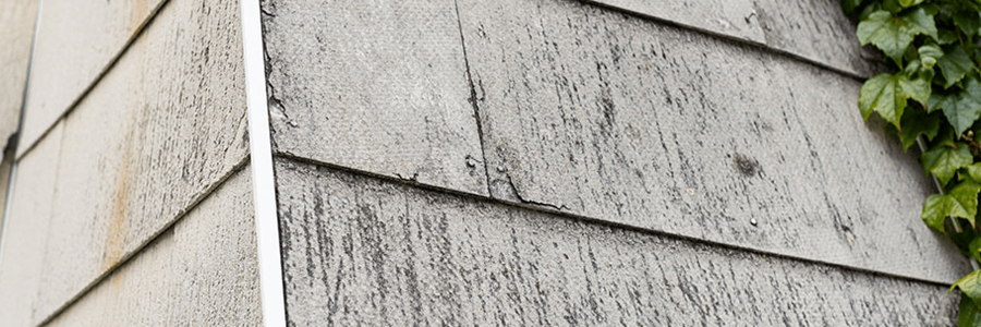 Asbestos cement soffit panels on older properties
