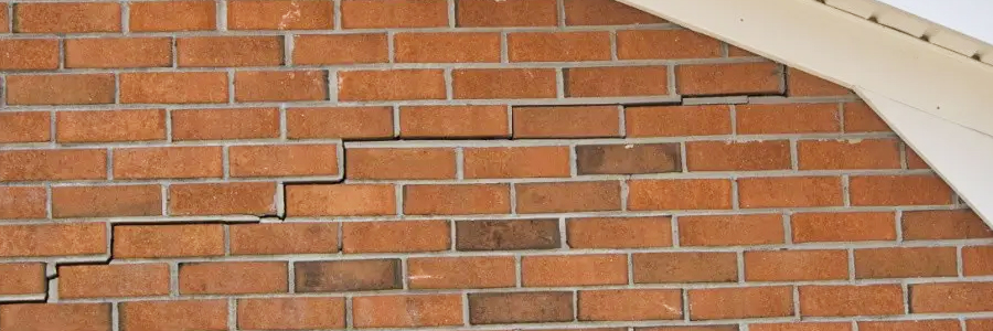 Small settlement crack near an opening